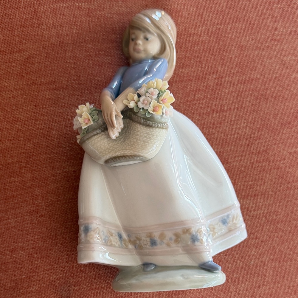 Lladro retired Porcelain Girl Figurine in Blue, White & Pastel Floral